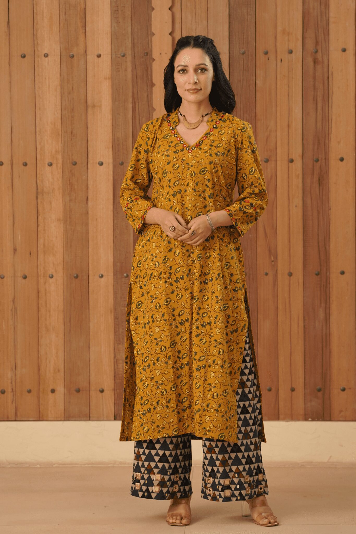 Mustard - Yellow Ajrakh Flare Kurta with side slits and mirror & thread hand embroidery in cotton fabric