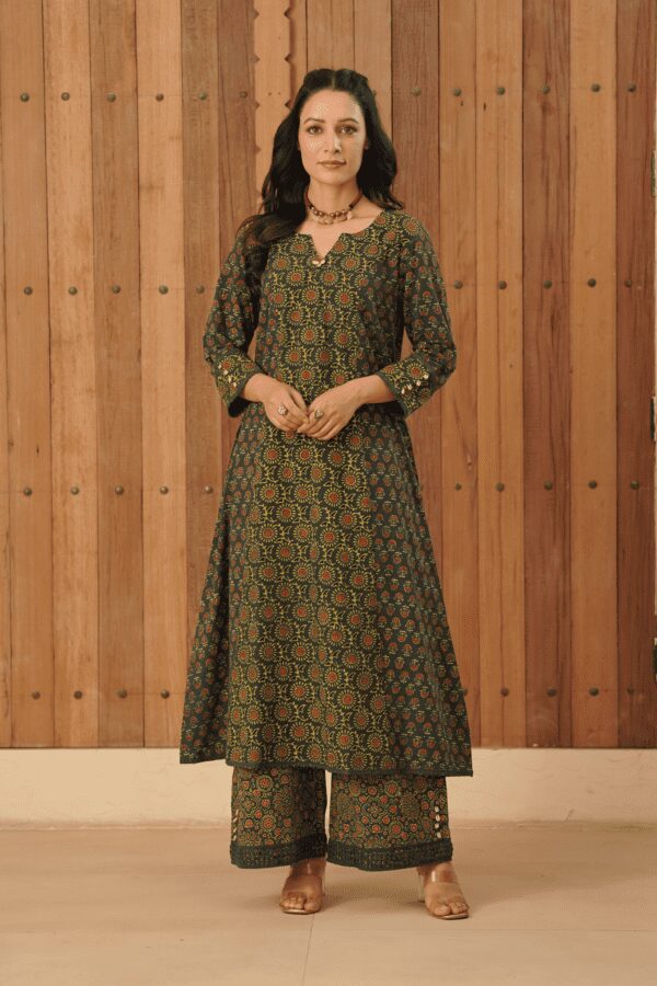 Green Ajrakh A-Line Kurta with Cowrie shells and crochet cotton lace detailing in Cotton Fabric