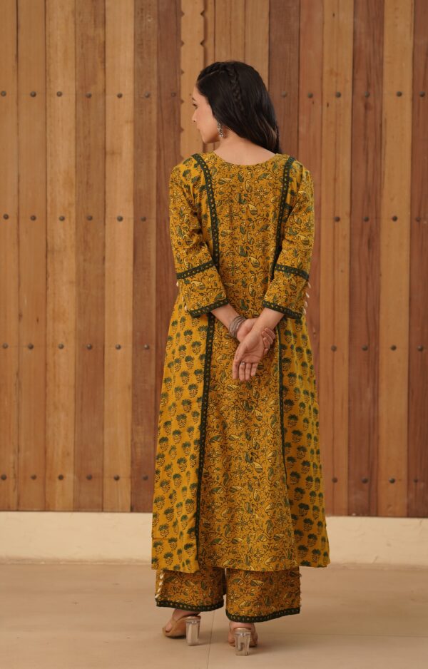 Mustard Yellow Ajrakh A-Line Kurta with cowrie shells and crochet lace detailing in cotton fabric - Image 9