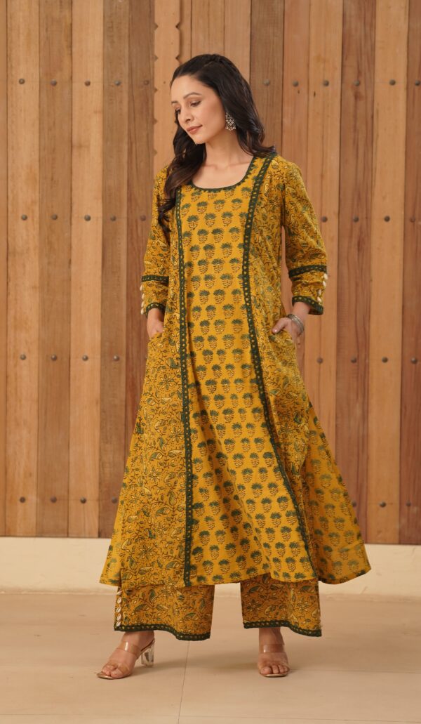 Mustard Yellow Ajrakh A-Line Kurta with cowrie shells and crochet lace detailing in cotton fabric - Image 3
