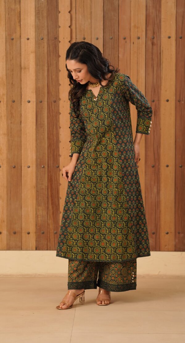 Green Ajrakh A-Line Kurta with Cowrie shells and crochet cotton lace detailing in Cotton Fabric - Image 2