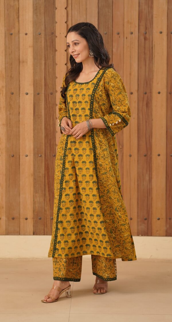 Mustard Yellow Ajrakh A-Line Kurta with cowrie shells and crochet lace detailing in cotton fabric - Image 4