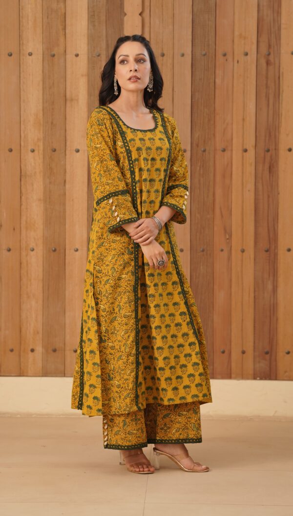 Mustard Yellow Ajrakh A-Line Kurta with cowrie shells and crochet lace detailing in cotton fabric - Image 5