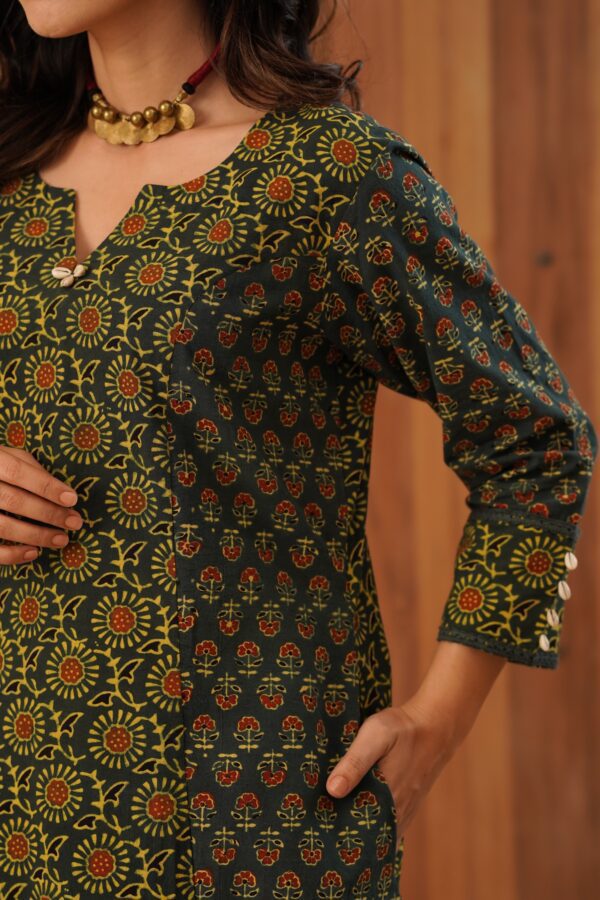 Green Ajrakh A-Line Kurta with Cowrie shells and crochet cotton lace detailing in Cotton Fabric - Image 3
