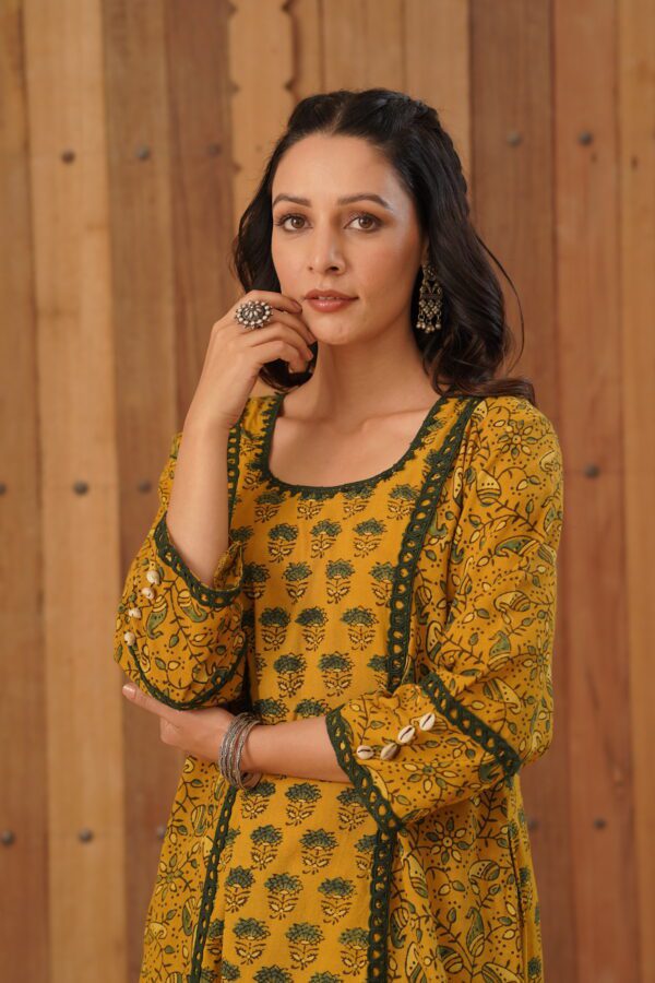 Mustard Yellow Ajrakh A-Line Kurta with cowrie shells and crochet lace detailing in cotton fabric - Image 7