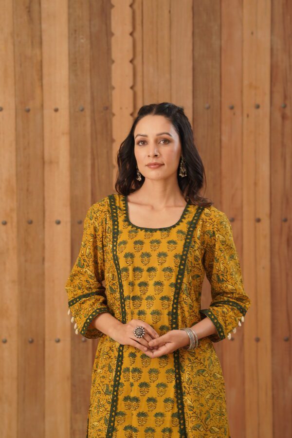 Mustard Yellow Ajrakh A-Line Kurta with cowrie shells and crochet lace detailing in cotton fabric - Image 8