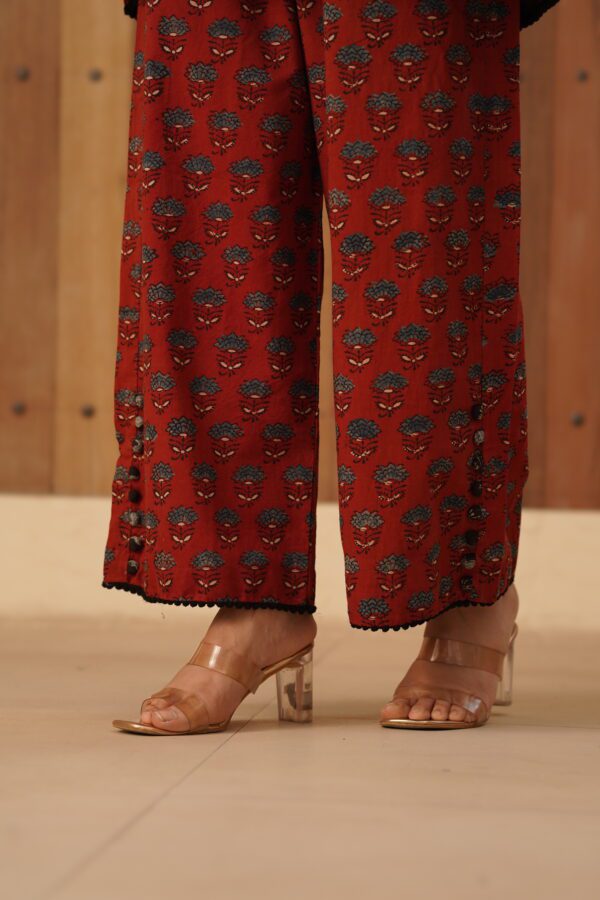 Maroon Ajrakh Palazzo with Fabric Potli Button and crochet lace detailing in cotton fabric - Image 2